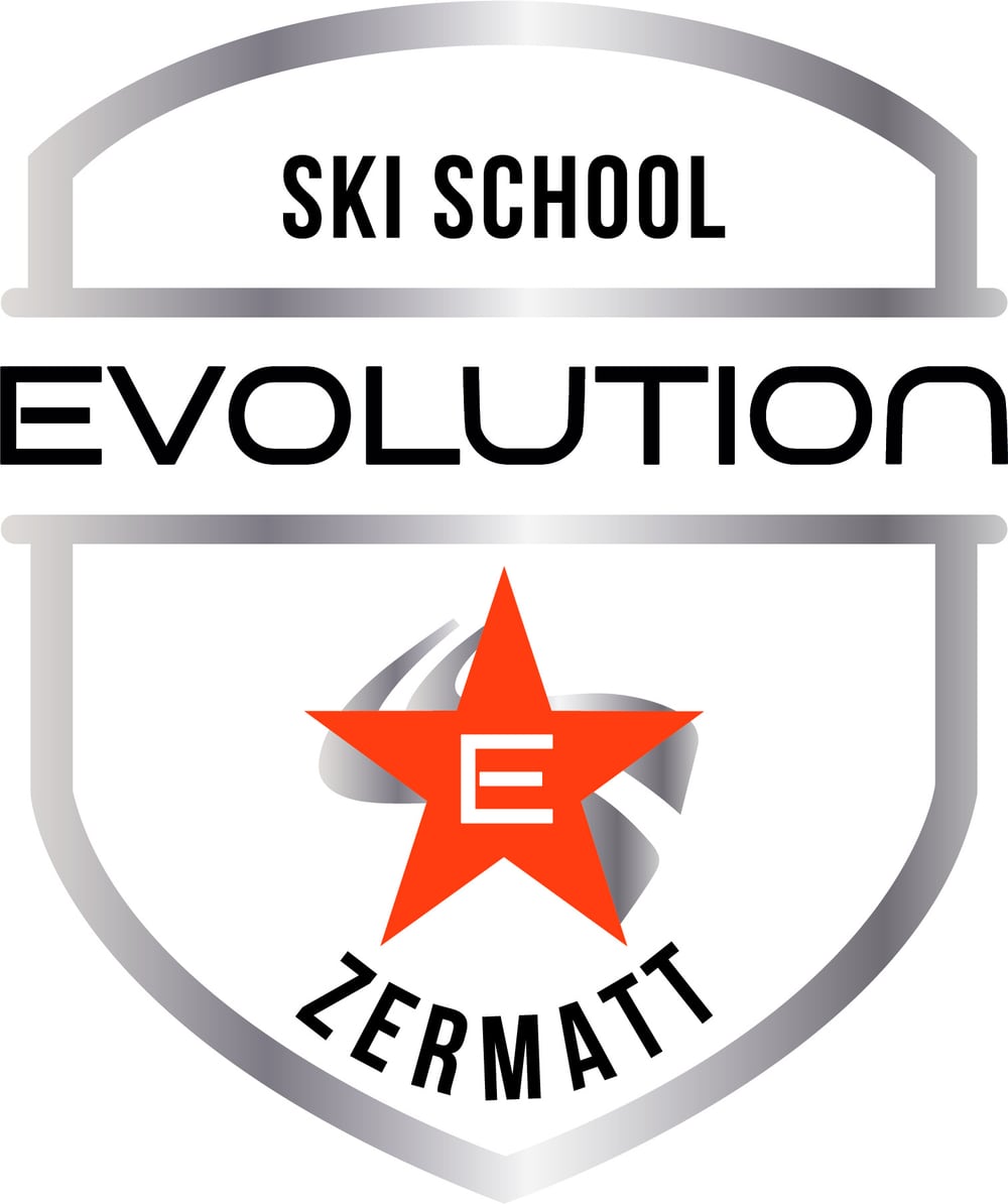 The Evolution Ski School Zermatt shield badge